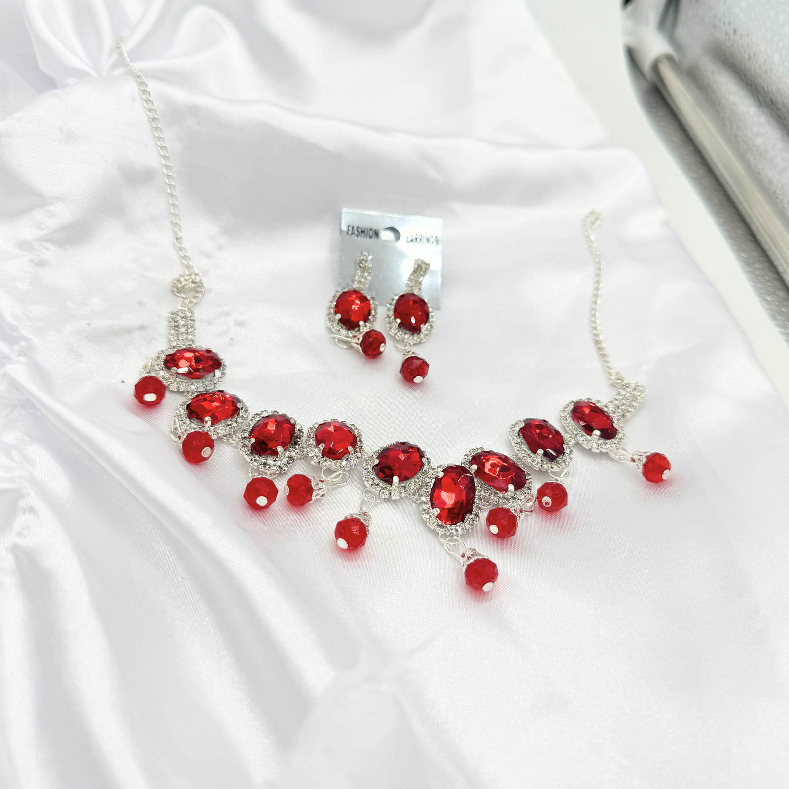 28 Crimson Glow Jewelry Set – Silver-Plated Necklace & Earrings with Red Oval Gemstones - Image 1